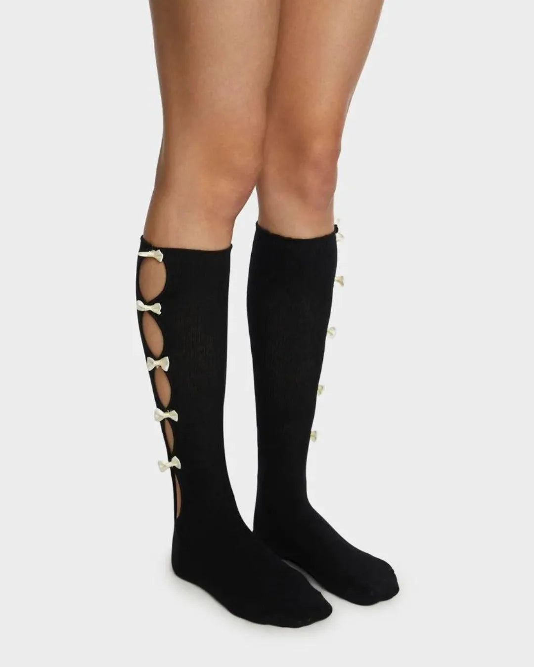 Calcetines altos con lazos