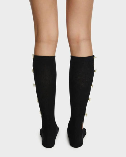 Calcetines altos con lazos